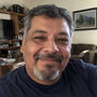 Selfie de un hombre salvadoreño de unos 45 años, sonriente.